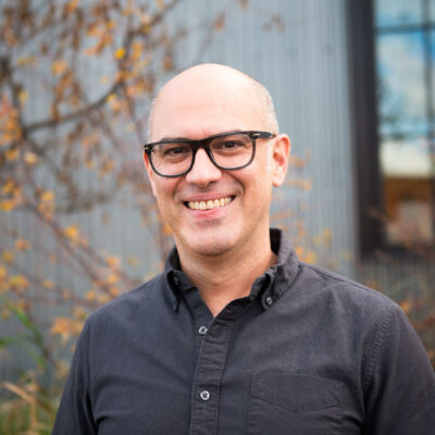 headshot of Alex Natsios, Associate Director at PIE